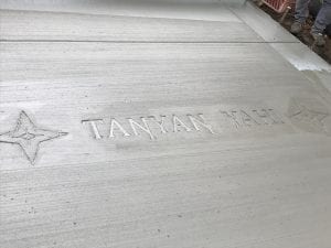 Bde Maka Ska Tanyan Yahi- Welcome Sidewalk Stamp Installation